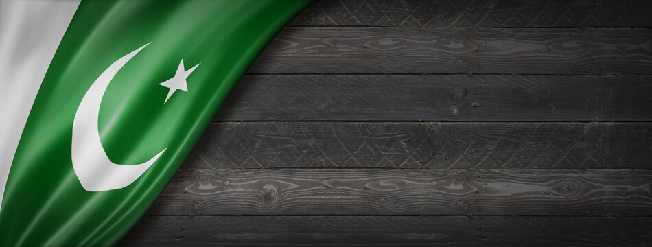 Pakistani flag on black wood wall banner