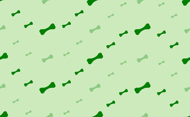Seamless pattern of large and small green dog bone symbols. The elements are arranged in a wavy. Vector illustration on light green background