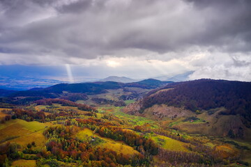 aerial view of Carpathian mountains countryside in autumn morning, Romania