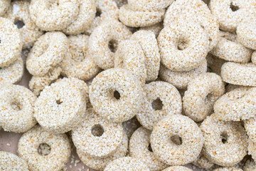 Sesame seed cookies. Round cookie shape with a hole. Sweets concept.