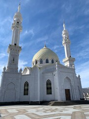 Beautiful White Mosque in Bolgar (spring). 
Tatarstan. Russia. Place of adoption of the Islamic religion. The concept of religion and islamic traditions