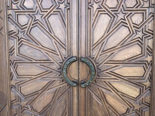 vintage wooden door; Grunge aged wooden texture of framed door panels.