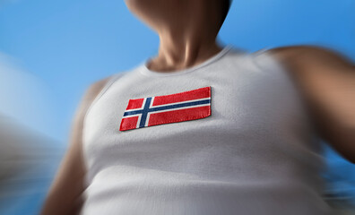 The national flag of Norway on the athlete's chest