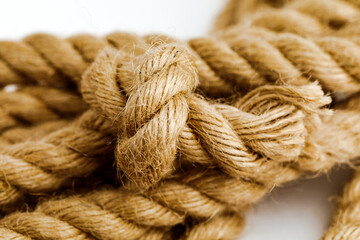 Ship ropes with a knot, isolated on a white background
