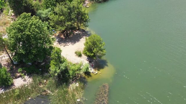 Aerial view of fishing village, pirogues fishing boats in Alanya, Turkey. Photo made by drone from above. Landscapes.