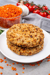 Healthy vegetarian or vegan food, meat free burger made from orange lentils legumes