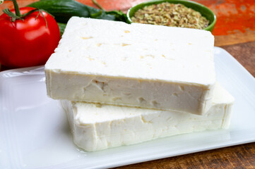 Cheese collection, white Greek salty feta cheese ready to eat