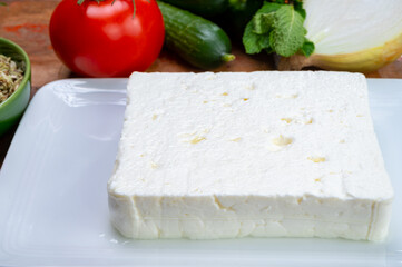 Cheese collection, white Greek salty feta cheese ready to eat