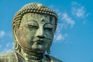 The Great Buddha or Daibutsu at Kotoku-in Buddhist Temple. A large bronze statue found in Kamakura,...