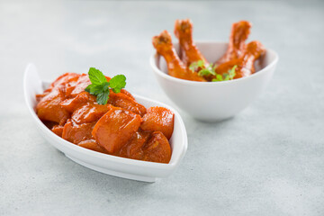 Raw marinated chicken