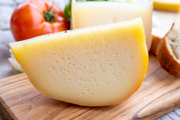 Cheese collection, French fol epi  cheese with many little holes and ossau iraty cheese