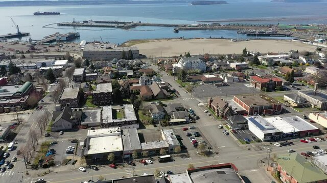 Cinematic aerial drone footage of downtown Everett, Bayside, Port Gardner, Naval Station Everett suburbs, bedroom communities North of Seattle on the shores of Puget Sound in Washington