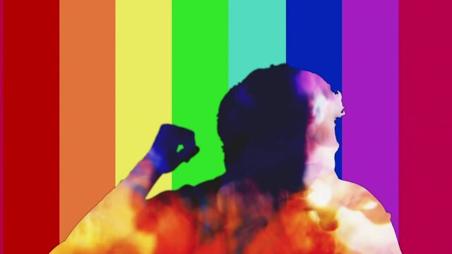 Silhouette: a man wearing headphones, frantically dancing to the music, filled with colorful ink, over a rainbow vertical bars pattern.
