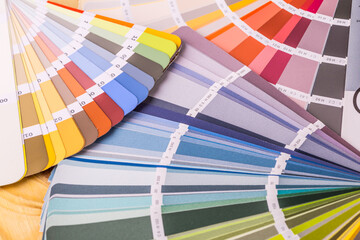 Close-up on color palette guide for printing and painting. Concept - choice of colors for design.