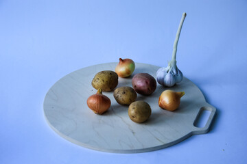 The most common vegetables are potatoes,onions, and garlic. © Людмилa