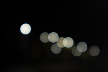 background with defocused lights at night, string of lights