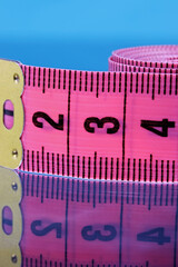 close-up colorful measuring tape on a background