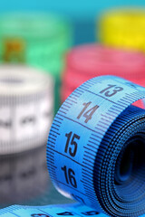 close-up colorful measuring tape on a background