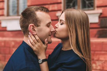 Happy young couple. The concept of a happy family with strong feelings. Young people in love