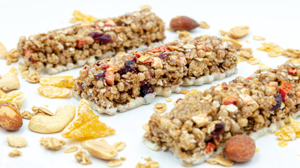 Granola healthy dessert bar Granola, cereal bars with nuts and berries, isolated on white background