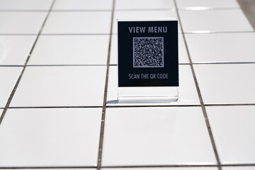 View menu and Scan the QR code sign on the table in the cafe