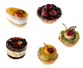 Cake stuffed with berries and citrus fruits on a white background isolated, top view, pastry, collage