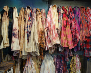 Two Wall Racks of Vintage Grunge Clothing