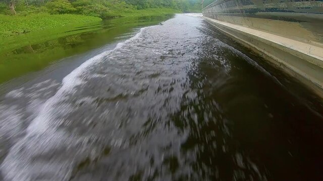 white boat on the oiapoque river amapa amazon rainforest close water 