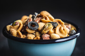 Mix of salted nuts in bowl.