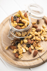 Mix of salted nuts in jar.