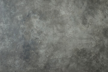 Obraz na płótnie Canvas the background is gray under the concrete blank