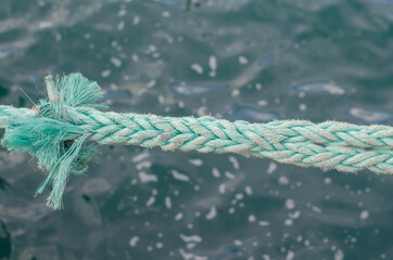 Marine rope. Moored ship. Synthetic fiber. Rope knot. Sisal rope.