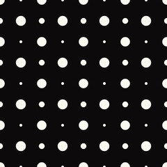 White same dots, but different size. Vector seamless polka dots.