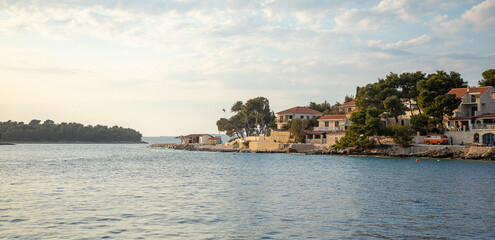 View of beach bar Punta in small village Maslinica in Solta Island, Croatia