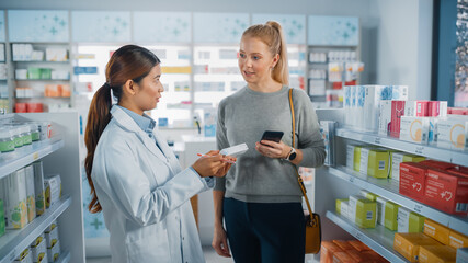 Pharmacy Drugstore: Caucasian Woman Chooses to Buy Medicine Professional Asian Pharmacist Advising,...