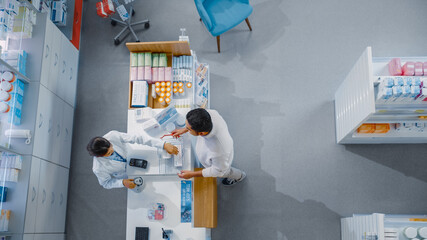 Pharmacy Drugstore Checkout Cashier Counter: Pharmacist Service Diverse Group of Customers Paying...