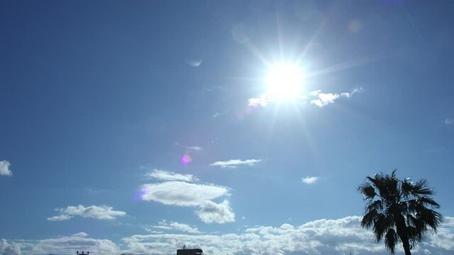 Energy of sun and wind on sunny day.