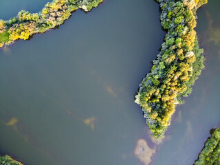 Freshwater lake with island, summer landscape, aerial view