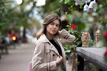 Glamor woman sitting at the street cafe in the morning