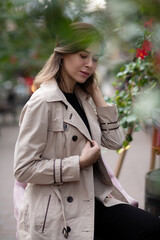 Romantic woman sitting at the street cafe in the morning