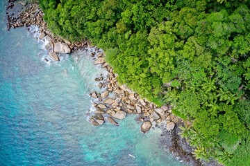 Drone field of view of sea and coastine with natural background forming patterns in nature, Praslin Island, Seychelles.
