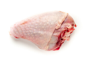 raw turkey leg with rosemary on white background