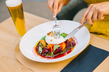 healthy salad with burrata cheese, arugula salad and beetroot