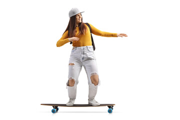 Full length shot of a cool female skater riding a longboard
