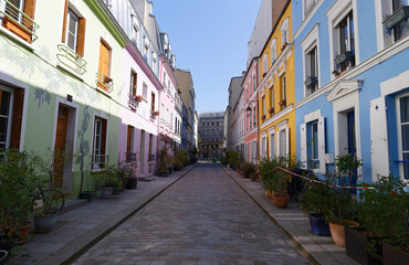 Fototapeta na wymiar Colorful houses at Cremieux street in the 12th District is one of the prettiest residential streets in Paris.