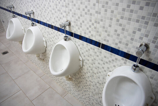 Public Restrooms Of The School. With Modern Design, New Hand Wash, Beautiful Colored Tiles, Faucet With Mirror And Window.