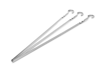 Metal skewers on white background. Barbecue utensil