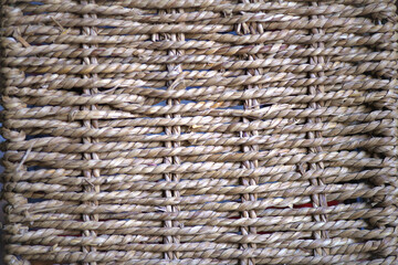 Background. Sea grass handmade braid wallpaper.