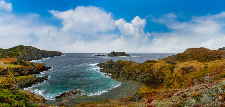 Panoramic seascape view on a rocky Atlantic Ocean Coast. Colorful Blue Sky Art Render. Taken at Crow Head, North Twillingate Island, Newfoundland and Labrador, Canada.