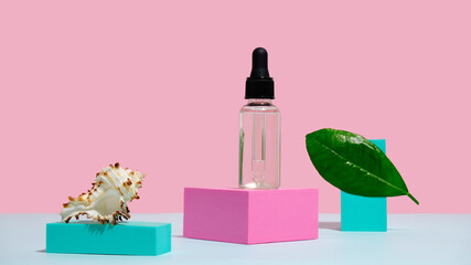 Transparent face serum bottle with pipette on trendy coloured pedestal. Collagen serum container mock up. Minimal style. Cosmetics product presentation. Summer skin care concept.